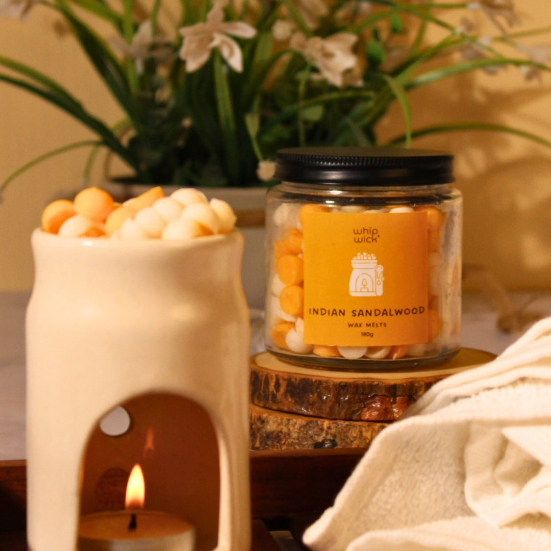 Indian Sandalwood Wax Melts with chandan wood, saffron, floral spices, amber, and musk for a calming and luxurious fragrance experience.