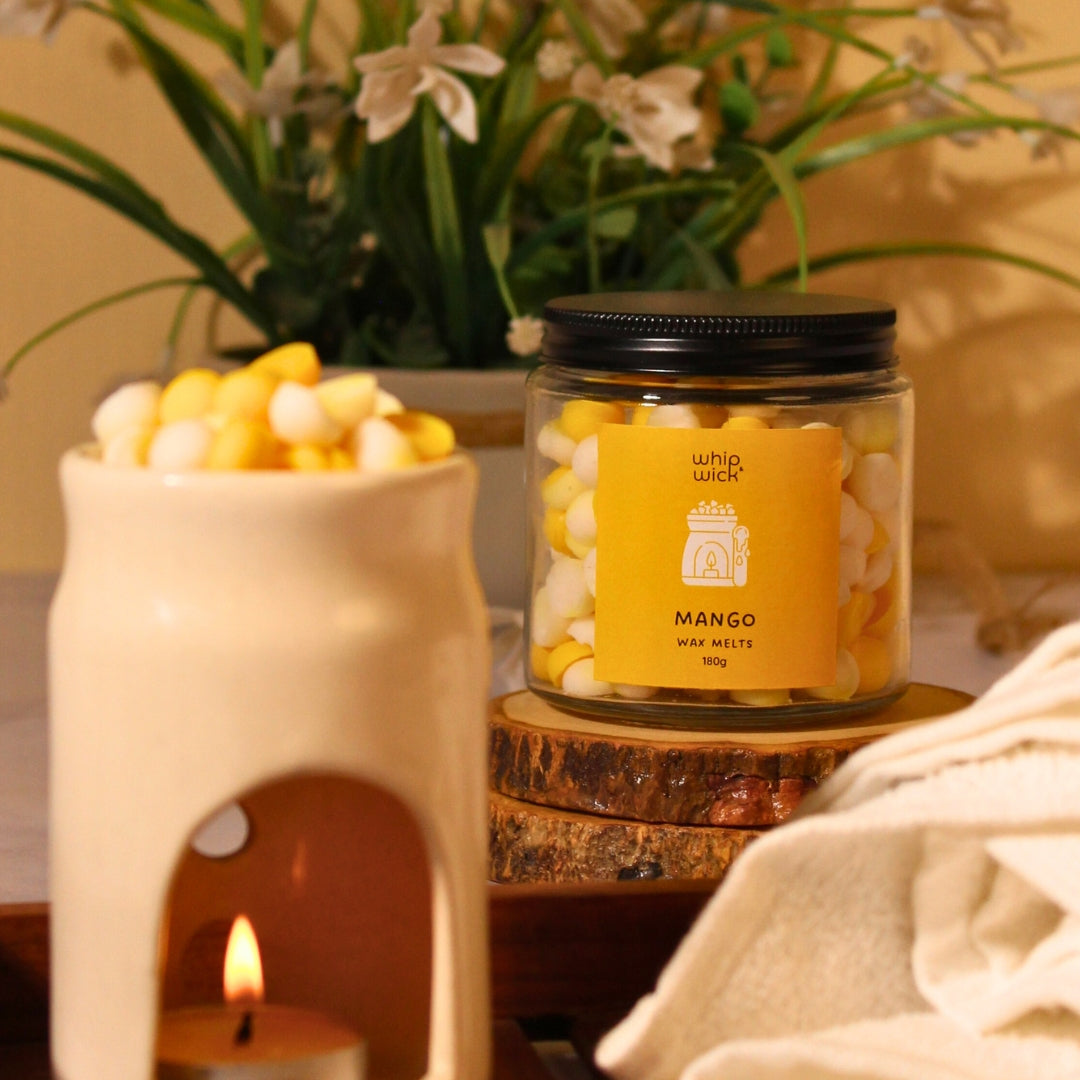Mango Wax Melts that blend ripe mangoes, juicy fruits, and vanilla ice cream for a sweet, tropical fragrance that fills your space with delicious warmth.
