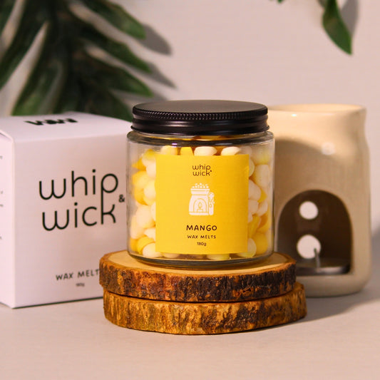Mango Wax Melts that blend ripe mangoes, juicy fruits, and vanilla ice cream for a sweet, tropical fragrance that fills your space with delicious warmth.