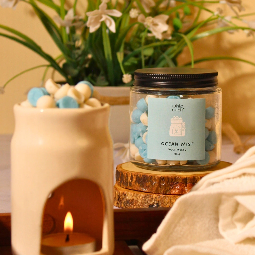Ocean Mist Wax Melts with a refreshing blend of aqua, sea salt, amber, and musk, creating an invigorating sea breeze atmosphere for your home.