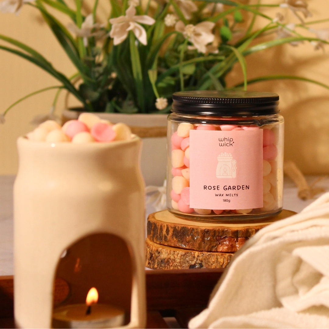 Rose Garden Wax Melts with the refreshing scent of roses, honey, and citrus for a serene, floral fragrance in your space.