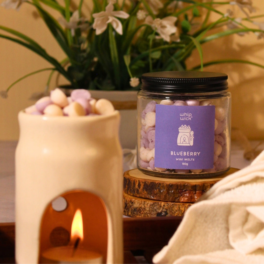 Blueberry Wax Melts releasing a juicy, sweet blueberry and vanilla scent that refreshes your space with a cozy, fruity aroma.