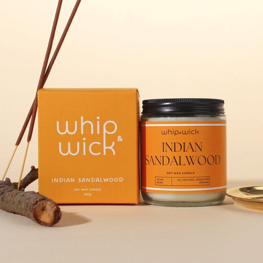 Indian Sandalwood Scented Candle with notes of chandan wood, saffron, floral spices, amber, and musk for a calming, earthy, and luxurious aroma.