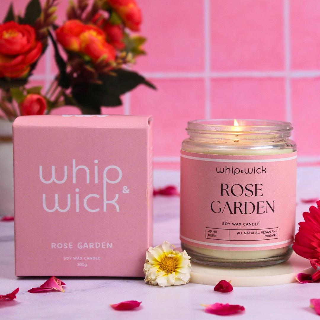 Rose Garden Scented Candle with fresh roses, honey, green tea, and musk for a soothing and elegant floral experience.