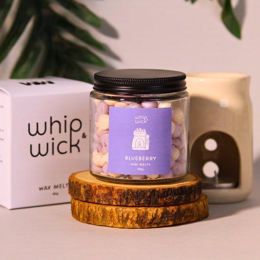 Blueberry Wax Melts releasing a juicy, sweet blueberry and vanilla scent that refreshes your space with a cozy, fruity aroma.