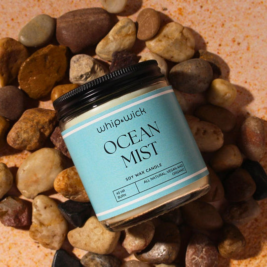 Ocean Mist Scented Candle with fresh aqua, sea salt, amber, musk, and driftwood, evoking a clean, invigorating sea breeze for your space.