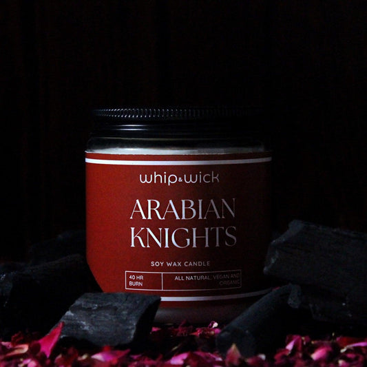 Arabian Knights Scented Candle with a rich, luxurious fragrance of roses, amberwood, and dark oud for a warm and exotic atmosphere.