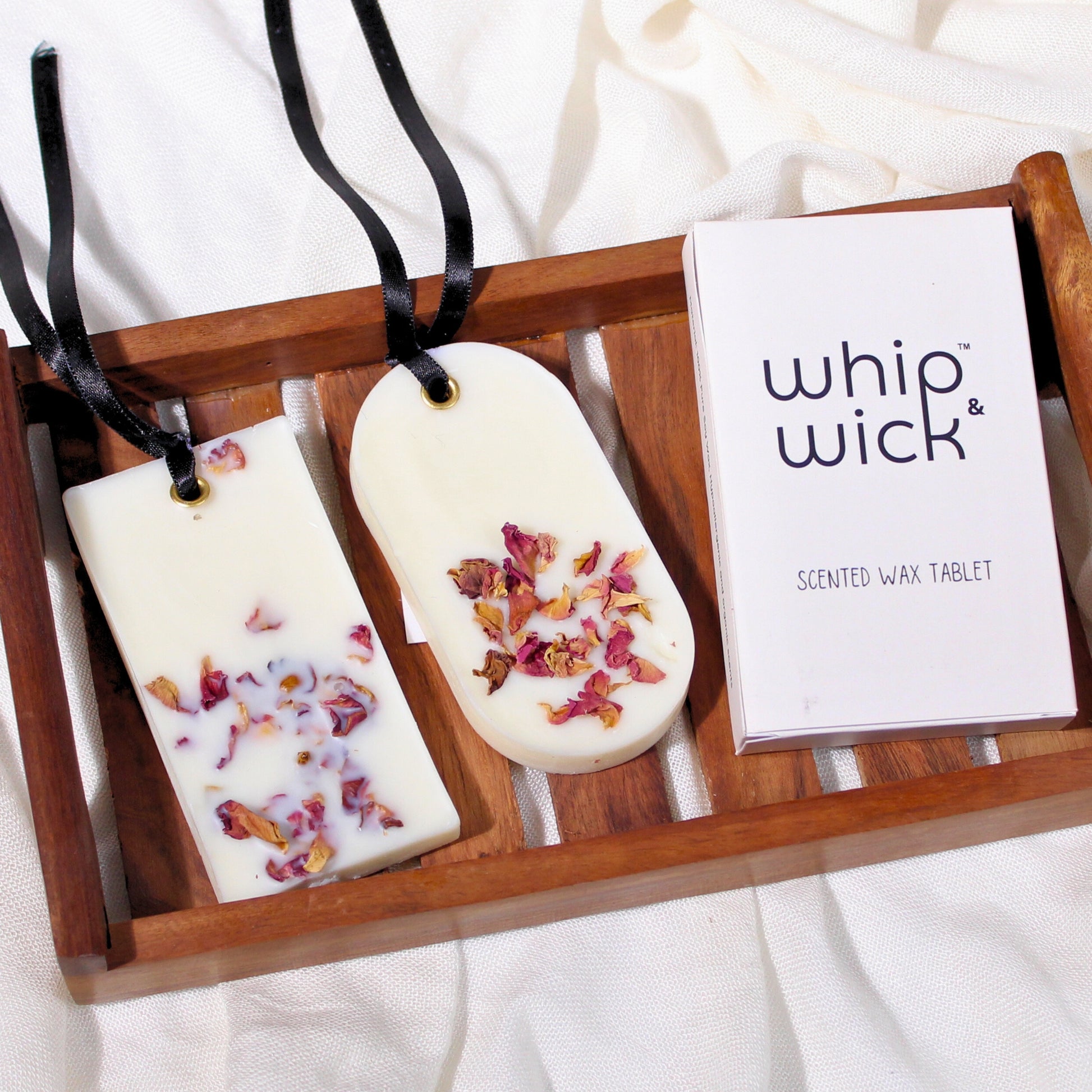 Desi Gulab Wax Tablet with top notes of roses and meadows, honey, lotus, and musk for a soothing, floral fragrance that enhances any space.