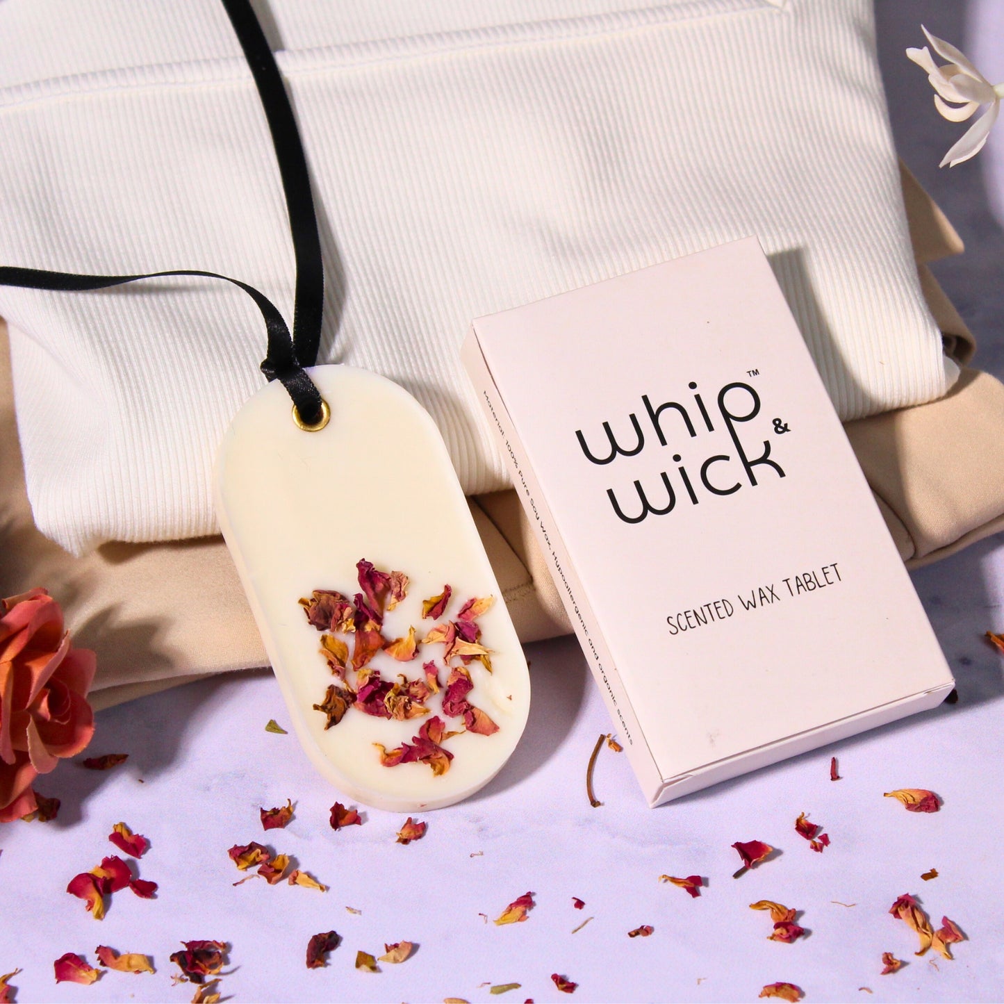 Desi Gulab Wax Tablet with top notes of roses and meadows, honey, lotus, and musk for a soothing, floral fragrance that enhances any space.