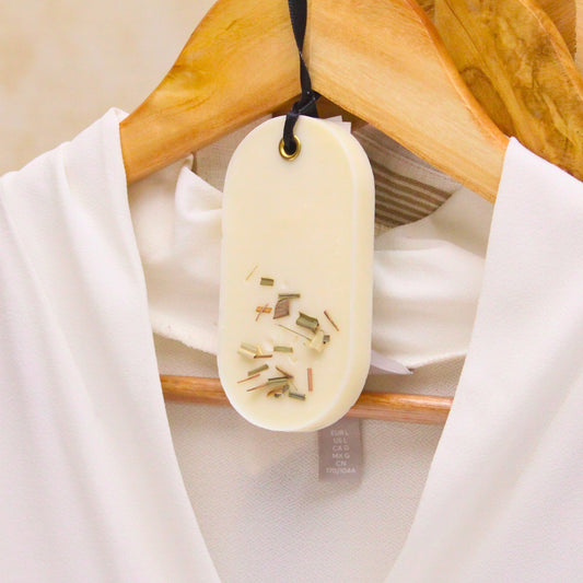 Dicey Limey Wax Tablet with lemongrass, lemon zest, bergamot, and honey notes, creating a refreshing, uplifting fragrance for your home