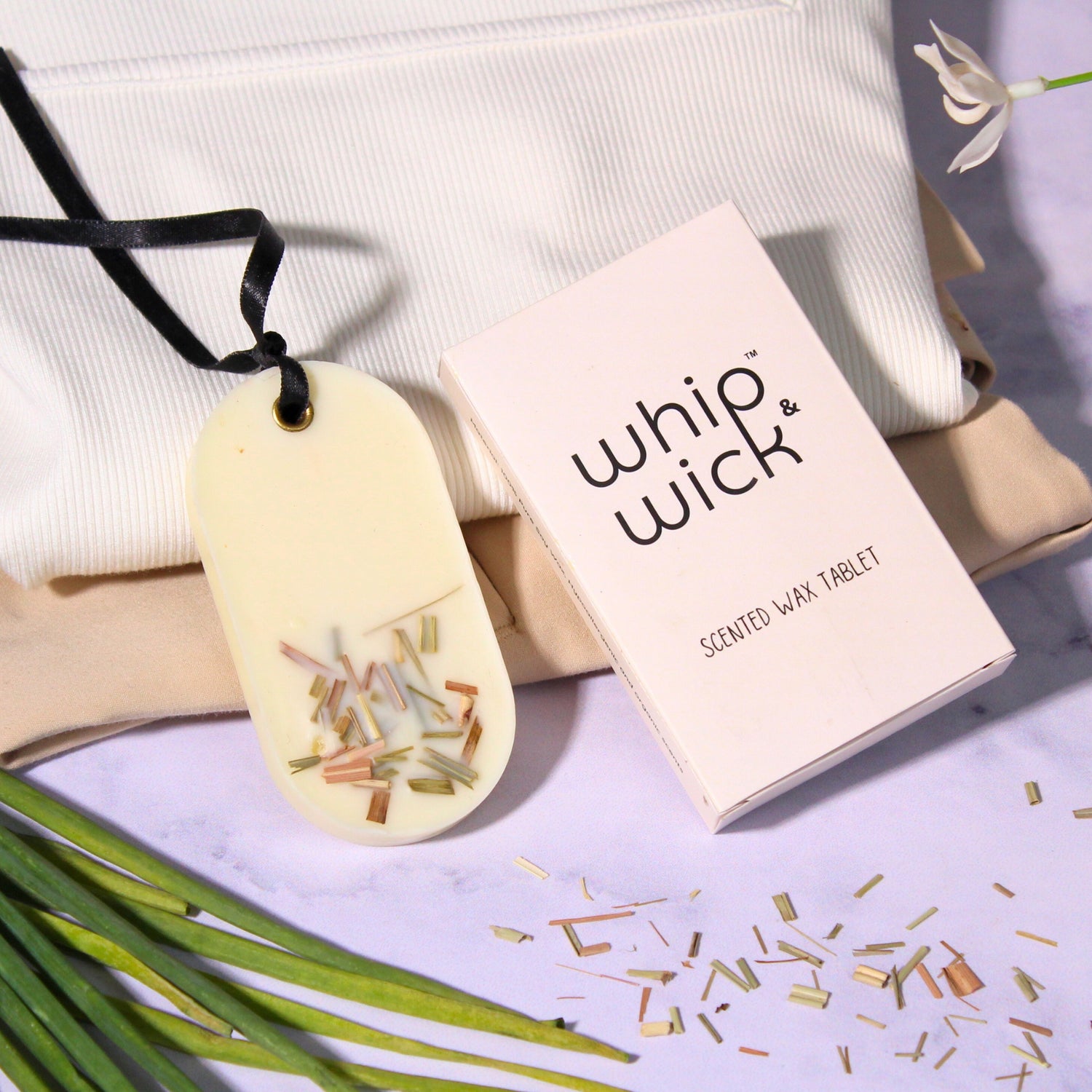 Dicey Limey Wax Tablet with lemongrass, lemon zest, bergamot, and honey notes, creating a refreshing, uplifting fragrance for your home